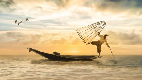 Sunset Fishing in Tranquil Waters wallpaper