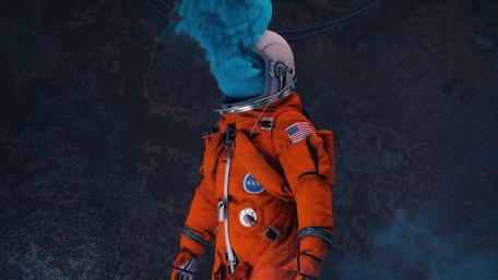 Astronaut Enshrouded in Mystic Blue Smoke wallpaper