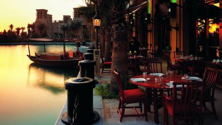 Charming Waterfront Cafe Experience wallpaper