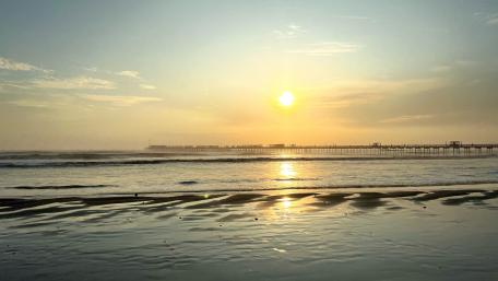 Sunrise Serenity at Pimentel Beach in Peru wallpaper