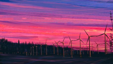 Ethereal Sunset Over Wind Turbine Fields wallpaper