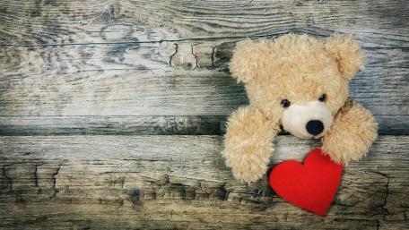 Tender Moments with a Teddy Bear and Heart wallpaper