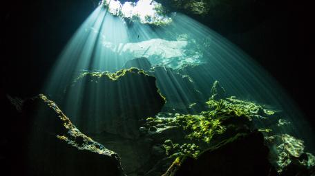 Cave Sunlight and Light Rays Dance Together wallpaper