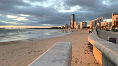 Sunset Over the African City Beach wallpaper
