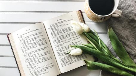 Peaceful Reading Nook with White Tulips and Coffee wallpaper