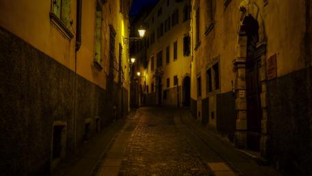 Mystical Nighttime Alleyway in a European City wallpaper