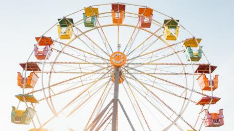 Colorful Ferris Wheel in Stunning Cityscape wallpaper