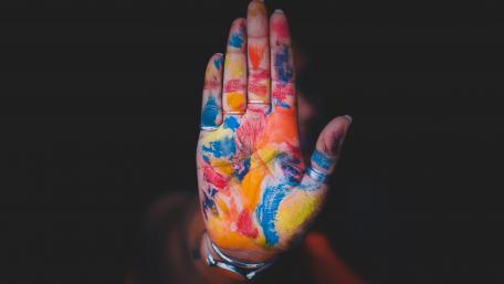 Colorful Expression of a Painted Hand wallpaper