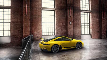 Vibrant Yellow Porsche 911 GT3 R Wallpaper wallpaper