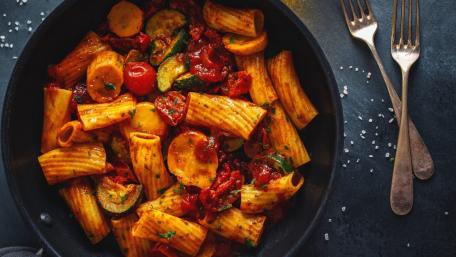 Delicious Penne Pasta with Fresh Vegetables and Rich Sauce wallpaper