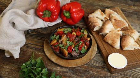 Colorful Vegetarian Delight with Bell Peppers and Bread wallpaper