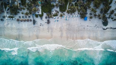 Tropical Bliss Over Tulum Beach wallpaper
