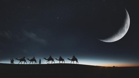 Mystical Night Caravan Under a Crescent Moon wallpaper