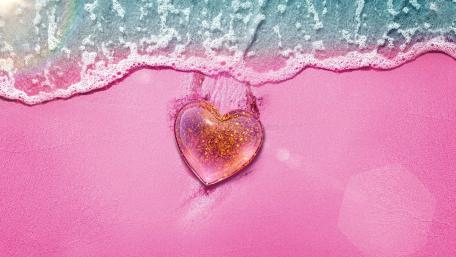 Pink Heart on a Sandy Beach wallpaper