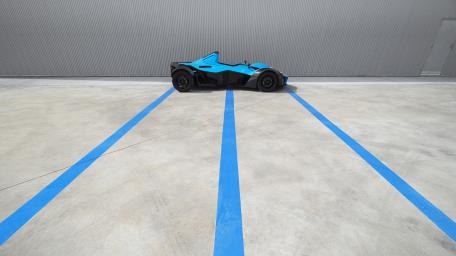 Vibrant Blue Sports Car Wallpaper wallpaper