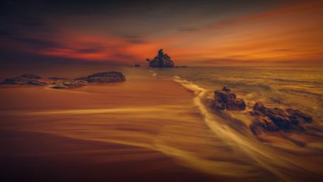 Tranquil Sunset Over Serene Shoreline wallpaper