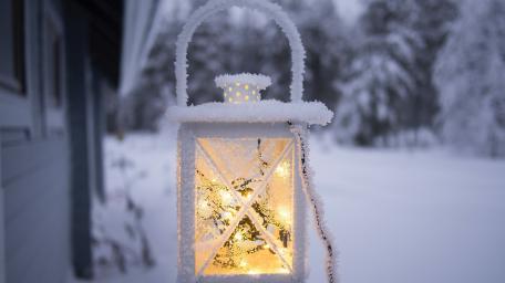 Frosty Lantern Illuminating Winter Wonderland wallpaper