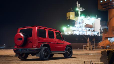 Stunning Red Mercedes-Benz G-Class at Nighttime Port Scene wallpaper