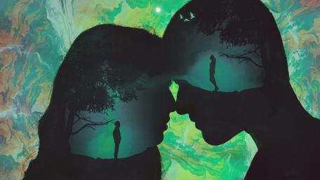 Silhouette Lovers in Surreal Landscape wallpaper