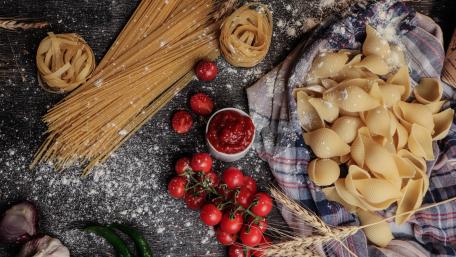 Delicious Pasta Preparation Scene for Food Lovers wallpaper
