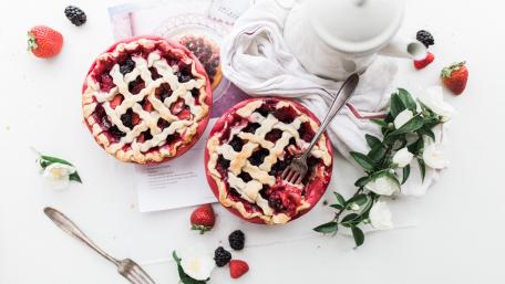 Delicious Berry Pie on a Relaxing Table Setting wallpaper