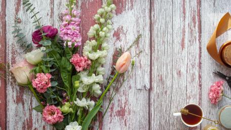 Blooming Beauty on Rustic Wood Planks wallpaper