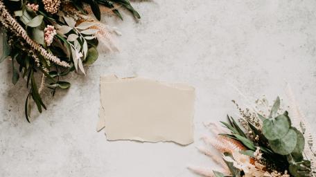Delicate Floral Arrangement on Textured Background wallpaper