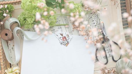 Elegant Floral Vignette with Musical Touches wallpaper