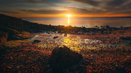 Golden Sunset Over Tranquil Shoreline Beauty wallpaper