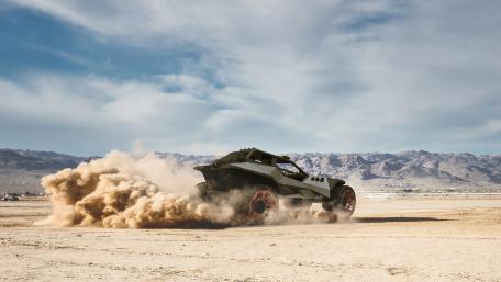 Futuristic Off-Road Buggy in Action wallpaper
