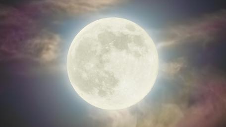 Majestic Full Moon Illuminating the Night Sky wallpaper