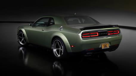 Sleek Dodge Challenger in Striking Green Finish wallpaper