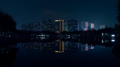 Urban Nightscape with Reflections in Water wallpaper