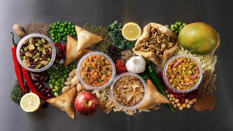Vibrant Spices and Snacks Layout for Food Lovers wallpaper