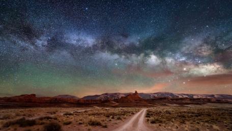 Vast Desert Under the Milky Way Night Sky wallpaper