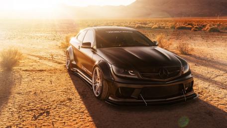Sleek Black Mercedes-Benz in Desert Landscape wallpaper