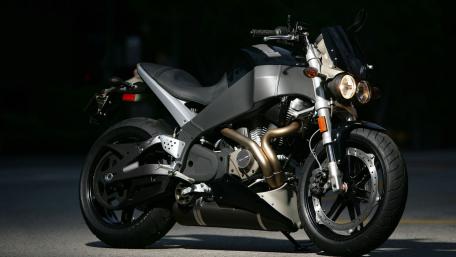 Sleek Buell XB12 Motorcycle in Action Shadows wallpaper
