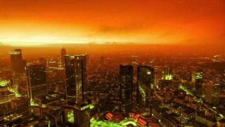 Vibrant Cityscape Under Orange Skies wallpaper