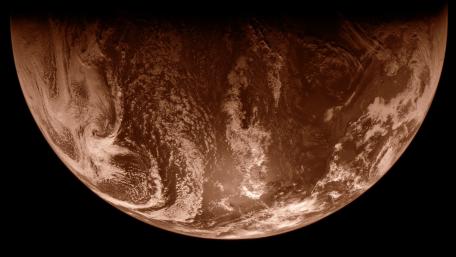 Serene Sepia Planet in Space View wallpaper