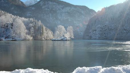 Serene Winter Landscape at a Frozen Lake wallpaper