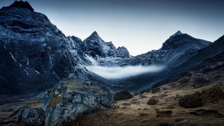 Majestic Peaks in a Serene Valley wallpaper