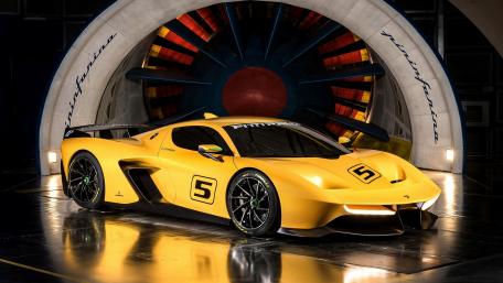 Sleek Yellow Pininfarina Sports Car Wallpaper wallpaper