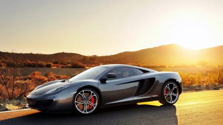 Sleek McLaren MP4-12C Under a Golden Sunset wallpaper