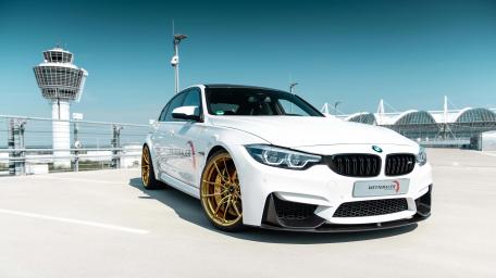 Sleek White BMW M3 Under Blue Skies wallpaper