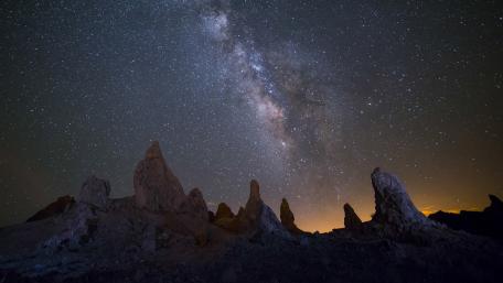 Starlit Serenity Above Ancient Rocks wallpaper