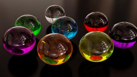 Vibrant 3D Crystal Marbles Displaying Artistic Depths wallpaper