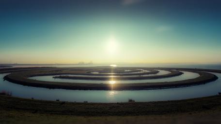 Serene Spiral of Waterway Reflection wallpaper