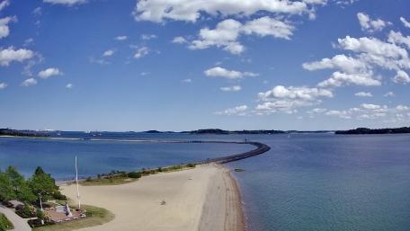 Serene Boston Beachscape Under Clear Skies wallpaper