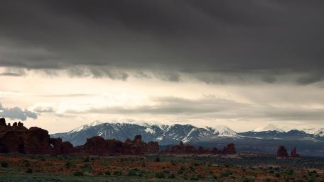 Majestic Mountains Under Dramatic Skies wallpaper