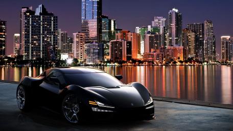 Sleek Supercar Against a Dazzling Cityscape at Night wallpaper
